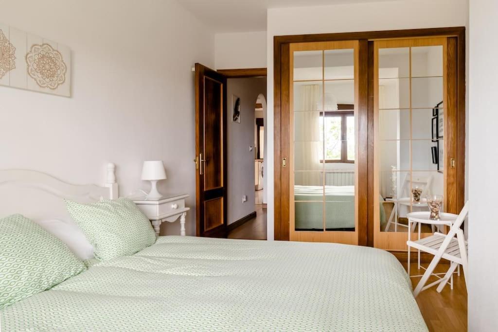 Casa De Las Flores - Apartamento Con Jardin Privado Frente A La Playa De Комільяс Екстер'єр фото